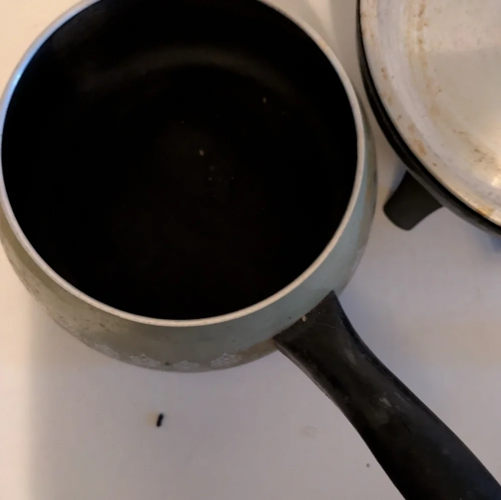 Vintage Oster Electric Fondue Set with forks.